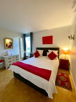 Un ou plusieurs lits dans un hébergement de l'établissement Appartement avec terrasse