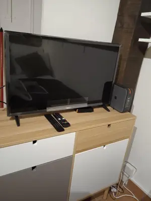 Télévision ou salle de divertissement dans l'établissement Au Centre historique de Paris (Marais)