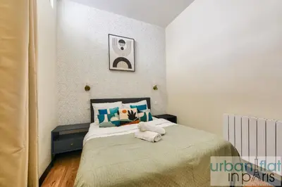Un ou plusieurs lits dans un hébergement de l'établissement Urban Flat 159 - Charming 3BDR Flat in Paris