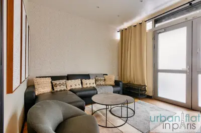 Coin salon dans l'établissement Urban Flat 159 - Charming 3BDR Flat in Paris