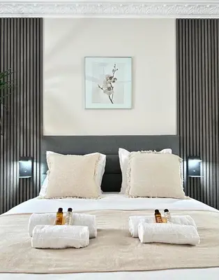 Un ou plusieurs lits dans un hébergement de l'établissement Le Marais - Prestige apartment with AC and lift for 8