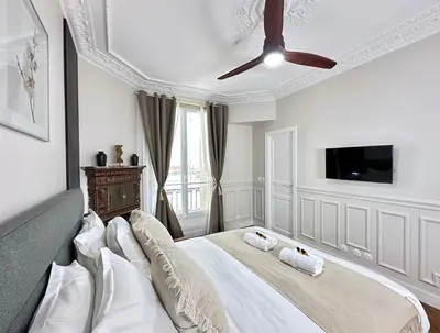 Un ou plusieurs lits dans un hébergement de l'établissement Le Marais - Prestige apartment with AC and lift for 8