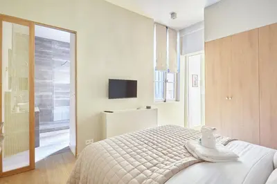 Télévision ou salle de divertissement dans l'établissement Apartment Le Marais by Studio prestige