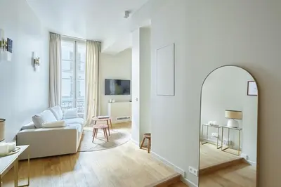 Télévision ou salle de divertissement dans l'établissement Apartment Le Marais by Studio prestige