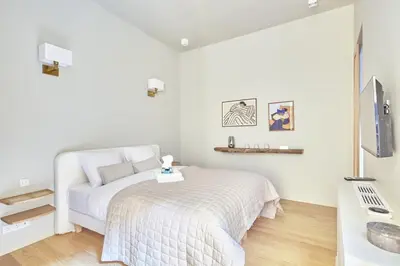 Un ou plusieurs lits dans un hébergement de l'établissement Apartment Le Marais by Studio prestige