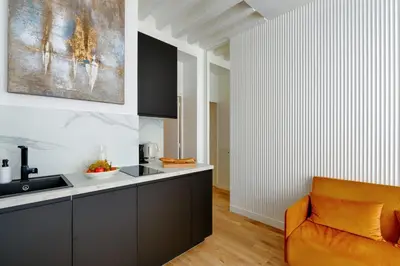 Coin salon dans l'établissement Appartement Design île St Louis - Welkeys