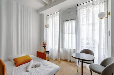 Un ou plusieurs lits dans un hébergement de l'établissement Appartement Design île St Louis - Welkeys