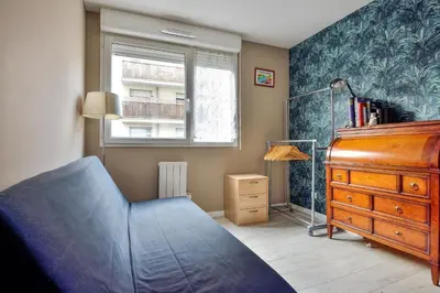 Un ou plusieurs lits dans un hébergement de l'établissement Appartement Olympe - Welkeys