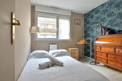 Un ou plusieurs lits dans un hébergement de l'établissement Appartement Olympe - Welkeys