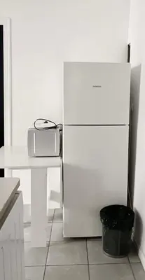 Cuisine ou kitchenette dans l'établissement Charmant appartement proche de la Tour Eiffel