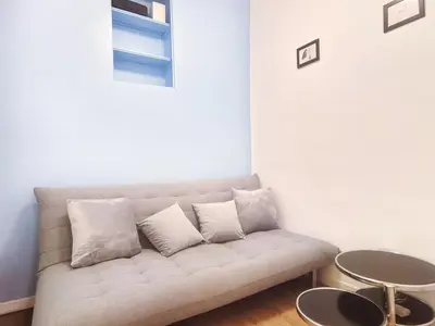 Coin salon dans l'établissement Charmant appartement proche de la Tour Eiffel