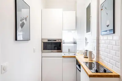 Cuisine ou kitchenette dans l'établissement GuestReady - Beautiful Getaway near Eiffel Tower
