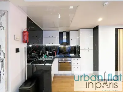 Cuisine ou kitchenette dans l'établissement Urban Flat 129 - Art Love Champs-Elysees