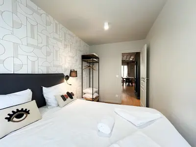 Un ou plusieurs lits dans un hébergement de l'établissement 02 - Pretty 4BDR Flat in Paris