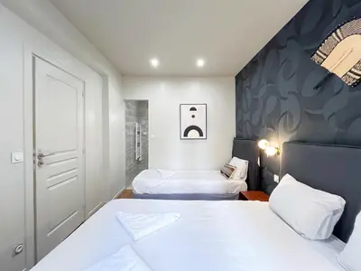 Un ou plusieurs lits dans un hébergement de l'établissement 02 - Pretty 4BDR Flat in Paris