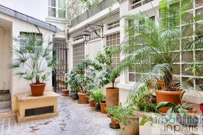 Jardin de l'établissement Urban Flat 70 - Authentic 3BDR Parisian Flat