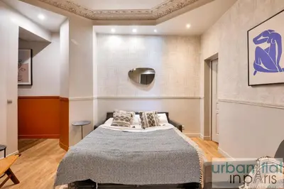 Un ou plusieurs lits dans un hébergement de l'établissement Urban Flat 57 - Luxury 4BDR Parisian Flat in Paris