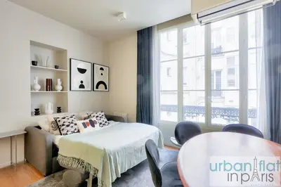 Un ou plusieurs lits dans un hébergement de l'établissement Urban Flat 110 - Luxury 3BDR Flat near Opera Paris