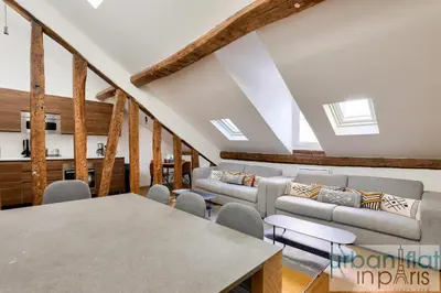 Coin salon dans l'établissement Urban Flat 117 - Charming 3BDR Apartment in Paris