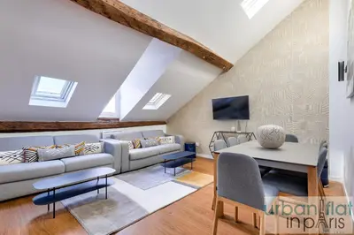 Coin salon dans l'établissement Urban Flat 117 - Charming 3BDR Apartment in Paris