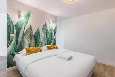 Un ou plusieurs lits dans un hébergement de l'établissement Sentier Réaumur - Beautiful Apartment III