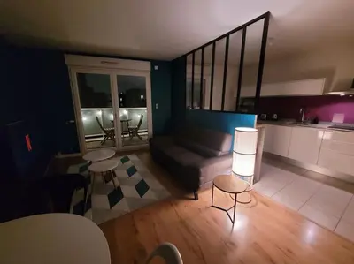 Coin salon dans l'établissement Cozy apartment at Paris doors with free car-park
