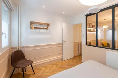 Un ou plusieurs lits dans un hébergement de l'établissement MAISON FRANCOIS : Cosy loft with AC