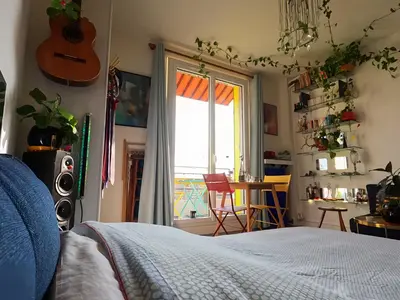 Un ou plusieurs lits dans un hébergement de l'établissement Canopée, paisible, chaleureux, lumineux, balcon