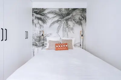 Un ou plusieurs lits dans un hébergement de l'établissement Alluring 1 bedroom Apartment 5 min to the Eiffel Tower!