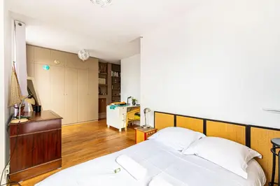 Un ou plusieurs lits dans un hébergement de l'établissement GuestReady - Studio Élégant vous Attend!