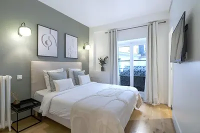 Un ou plusieurs lits dans un hébergement de l'établissement AmazingApartment #GalleriesLafayette #Madeleine#AC