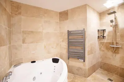 Salle de bains dans l'établissement Studio avec jacuzzi dans le 10e