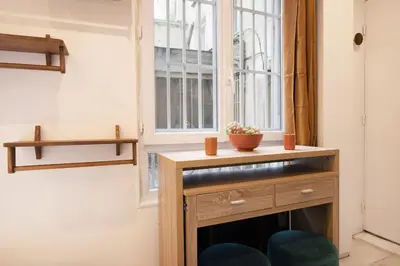 Cuisine ou kitchenette dans l'établissement Studio avec jacuzzi dans le 10e