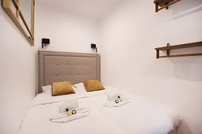 Un ou plusieurs lits dans un hébergement de l'établissement Luxury Suite w/ Jacuzzi - Rex / Montorgueil