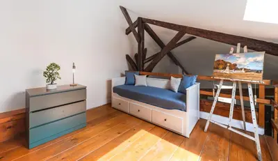 Un ou plusieurs lits dans un hébergement de l'établissement Appartements de charme Paris Expo Porte de Versailles