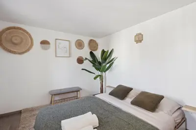 Un ou plusieurs lits dans un hébergement de l'établissement A Rooftop in Paris