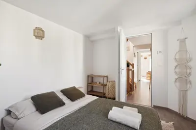 Un ou plusieurs lits dans un hébergement de l'établissement A Rooftop in Paris