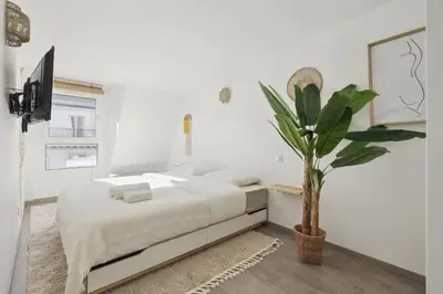 Un ou plusieurs lits dans un hébergement de l'établissement A Rooftop in Paris