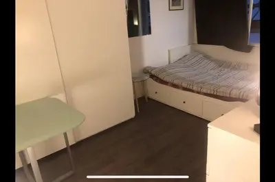 Un ou plusieurs lits dans un hébergement de l'établissement Studio sympa,proche de la gare