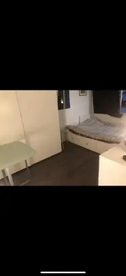 Un ou plusieurs lits dans un hébergement de l'établissement Studio sympa,proche de la gare