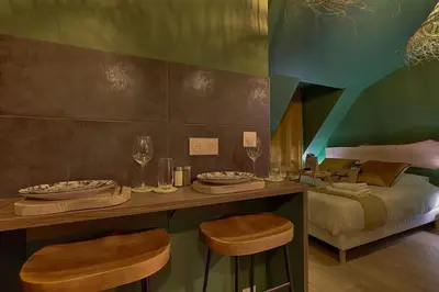Coin salon dans l'établissement Welcome to Panama Jungle/Jacuzzi