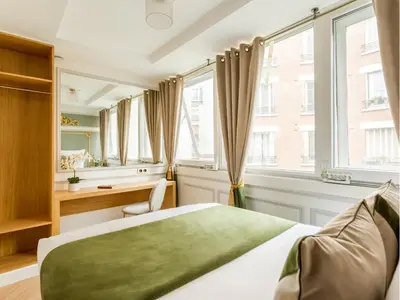 Un ou plusieurs lits dans un hébergement de l'établissement Merveil - Luxury Suite - Tour Eiffel - Fremicourt
