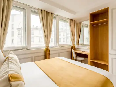 Un ou plusieurs lits dans un hébergement de l'établissement Merveil - Luxury Suite - Tour Eiffel - Fremicourt