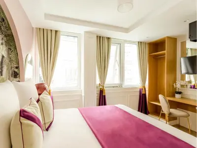 Un ou plusieurs lits dans un hébergement de l'établissement Merveil - Luxury Suite - Tour Eiffel - Fremicourt