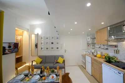Cuisine ou kitchenette dans l'établissement Les Patios du Marais 1