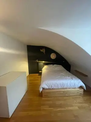 Un ou plusieurs lits dans un hébergement de l'établissement Magnifique appartement Paris 10ème