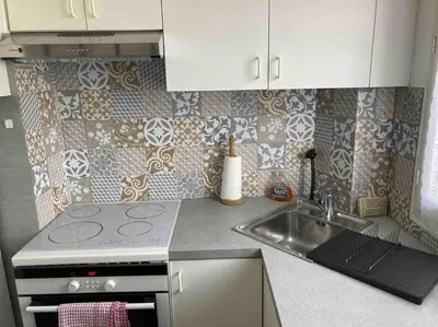 Cuisine ou kitchenette dans l'établissement Le Daumesnil Apartment + Balcon 2BR 4/6peoples