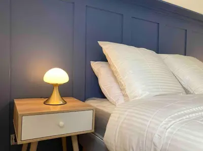 Un ou plusieurs lits dans un hébergement de l'établissement Le Daumesnil Apartment + Balcon 2BR 4/6peoples