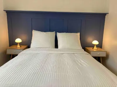 Un ou plusieurs lits dans un hébergement de l'établissement Le Daumesnil Apartment + Balcon 2BR 4/6peoples