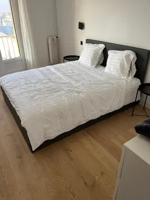 Un ou plusieurs lits dans un hébergement de l'établissement Appartement de charme sur les toits de Boulogne !